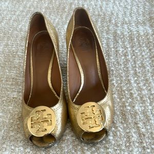 Well loved gold wedge shoes